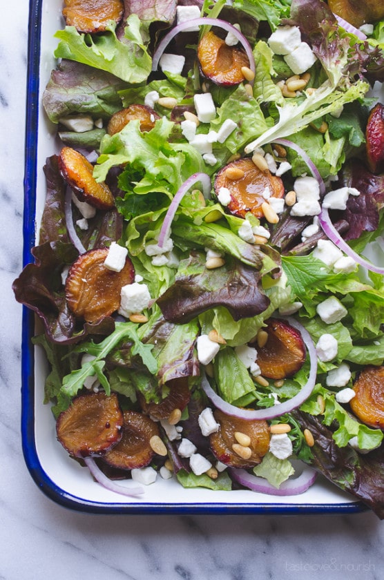 Mixed Greens with Plums and Marinated Goat Cheese