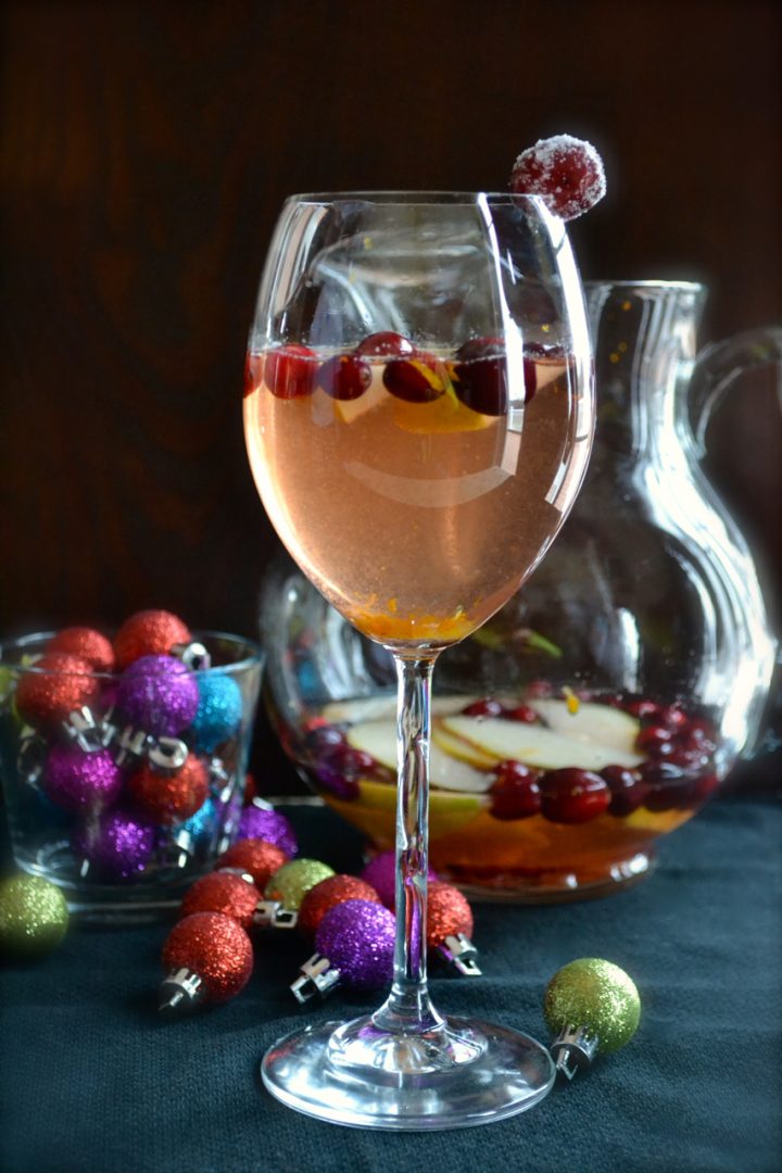 Cranberry Pear Christmas Sangria - make this easy sangria with red or white wine. | @tasteLUVnourish | #sangria #cocktail #holiday