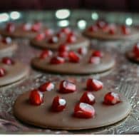 Pomegranate Mendiants - create these healthier treats in minutes! So delicious with creamy chocolate and a pop of juicy pomegranate! | @tasteLUVnourish on www.tasteloveandnourish.com