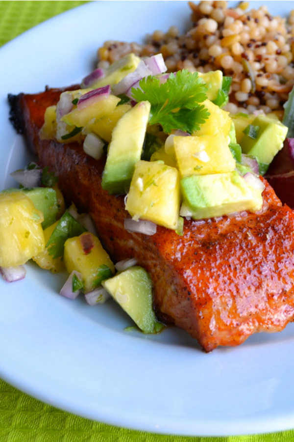 This delicious Chipotle Grilled Salmon with Pineapple Avocado Salsa has a sweet and spicy dry rubbed salmon and topped with an amazing citrusy salsa. | @tasteLUVnourish