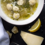 This Italian Wedding Soup made with chicken is light and healthy, but so delicious with buttery Parmesan and a bit of fresh lemon | @tasteLUVnourish