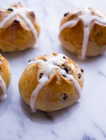 Hot Cross Buns - slightly sweet with a hint of spice and dotted with currants. The perfect little bun. | @tasteLUVnourish on www.tasteloveandnourish.com