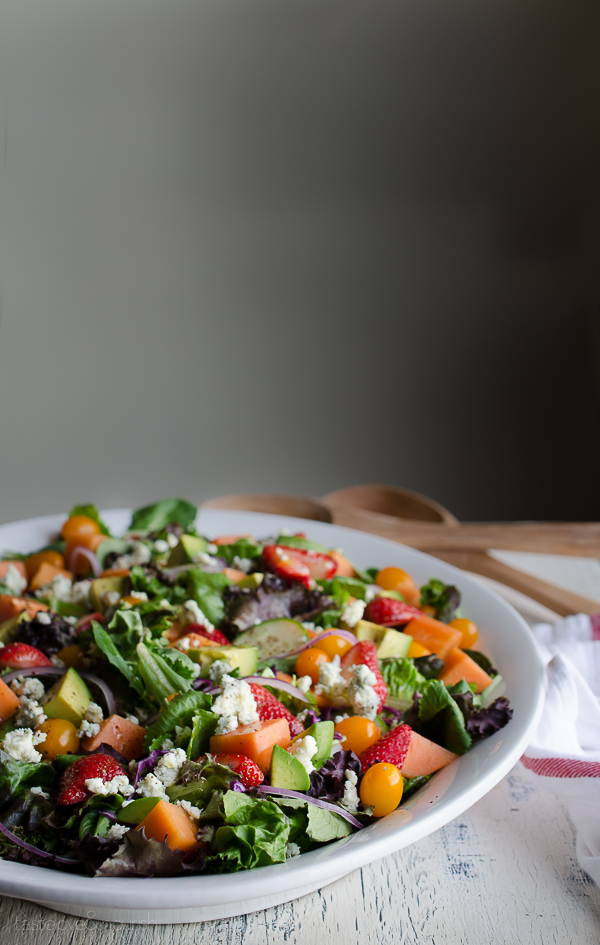 This Strawberry Papaya Salad is loaded with amazing flavors! I love the sweetness from the fruit balanced with the tanginess of the dressing and blue cheese. The added sumac to the lemony vinaigrette enhances the flavors so much. From @tasteLUVnourish on TasteLoveAndNourish.com