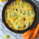 Asparagus Tomato and Cheddar Frittata - this recipe could not be more simple. Perfect for breakfast, brunch or dinner. Use your favorite ingredients with this simple method. | @tasteLUVnourish on TasteLoveAndNourish.com