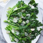 Broccoli Rabe (Rapini) with Garlic Parmesan and Lemon - use these easy steps to prepare broccoli rabe (rapini) for a great side dish. This method removes the bitterness that naturally occurs with broccoli rabe. | @tasteLUVnourish on TasteLoveAndNourish.com