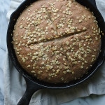 This Whole Wheat No-Knead Skillet Bread is so incredibly easy, crusty and delicious! It makes a perfect bread to serve with meals with soft butter or a dish of olive oil. | @tasteLUVnourish on TasteLoveAndNourish.com