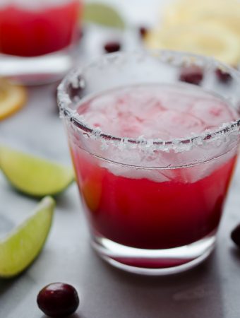 Fresh Cranberry and Orange Margarita - made with fresh cranberries…so delicious! Cheers!