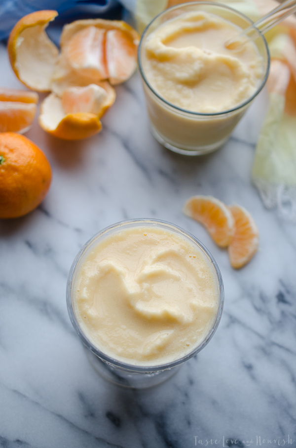 This Mandarin Orange Creamsicle Smoothie recipe is so delicious! It's thick, frosty and tastes like dessert! No added sugar and under 85 calories each! | @tasteLUVnourish