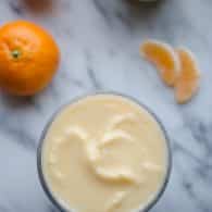 This Mandarin Orange Creamsicle Smoothie recipe is so delicious! It's thick, frosty and tastes like dessert! No added sugar and under 85 calories each! | @tasteLUVnourish