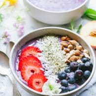 Peach Berry Protein Smoothie Bowl - this easy vegan smoothie bowl is packed with plant based protein! Makes a perfect start to your day or a nourishing snack or dessert! TasteLoveAndNourish.com