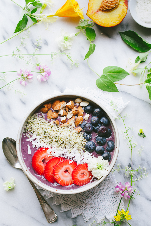 Peach Berry Protein Smoothie Bowl - this easy vegan smoothie bowl is packed with plant based protein! Makes a perfect start to your day or a nourishing snack or dessert! TasteLoveAndNourish.com
