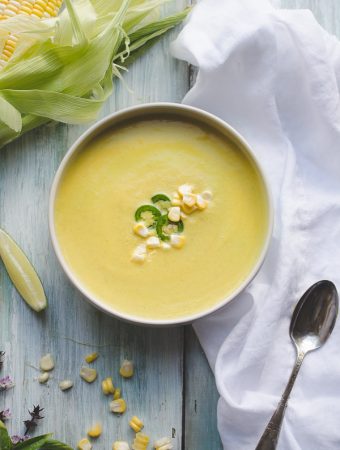 This Coconut Jalapeño Corn Soup is silky and sweet, with hints of jalapeño. The pop of sweet corn kernels make a perfect garnish! I love this trick to get the most flavor from fresh summer corn! @tasteLUVnourish