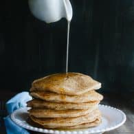 This simple Whole Wheat Vegan Pancake recipe is my family's new go-to! No one will ever guess they are vegan or made with whole wheat! Fluffy, light and delicious! @tasteLUVnourish