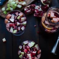 This festive Apple Pomegranate Sangria is a super simple recipe that may become you new favorite cocktail! | @tasteLUVnourish