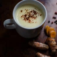 This warming Golden Milk Latte tastes like a coffeehouse chai latte, but this easy recipe is full of health benefits. | Vegan Friendly | Gluten Free | @tasteLUVnourish