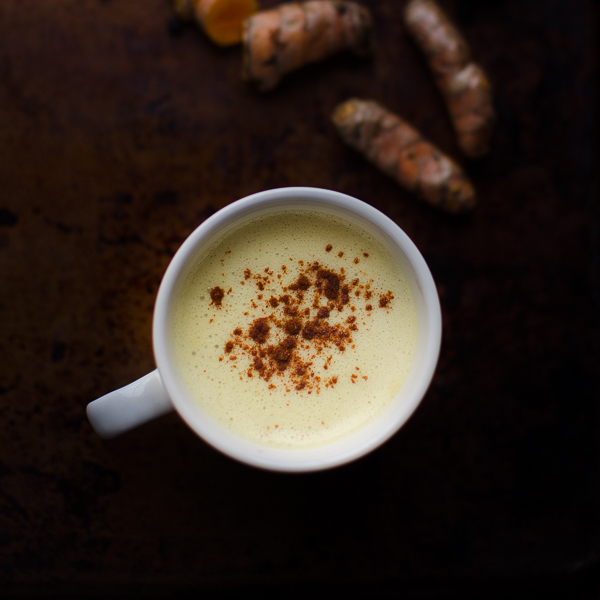 This warming Golden Milk Latte tastes like a coffeehouse chai latte, but this easy recipe is full of health benefits. | Vegan Friendly | Gluten Free | @tasteLUVnourish