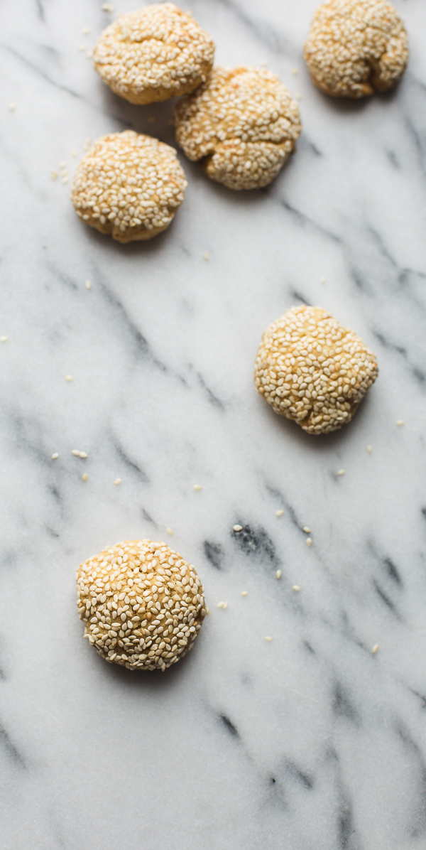 These Greek Olive Oil Cookies are lightly sweetened with a great crunch and nutty flavor from toasty sesame seeds. Perfect with a cup of coffee or tea. | @tasteLUVnourish | Vegan |