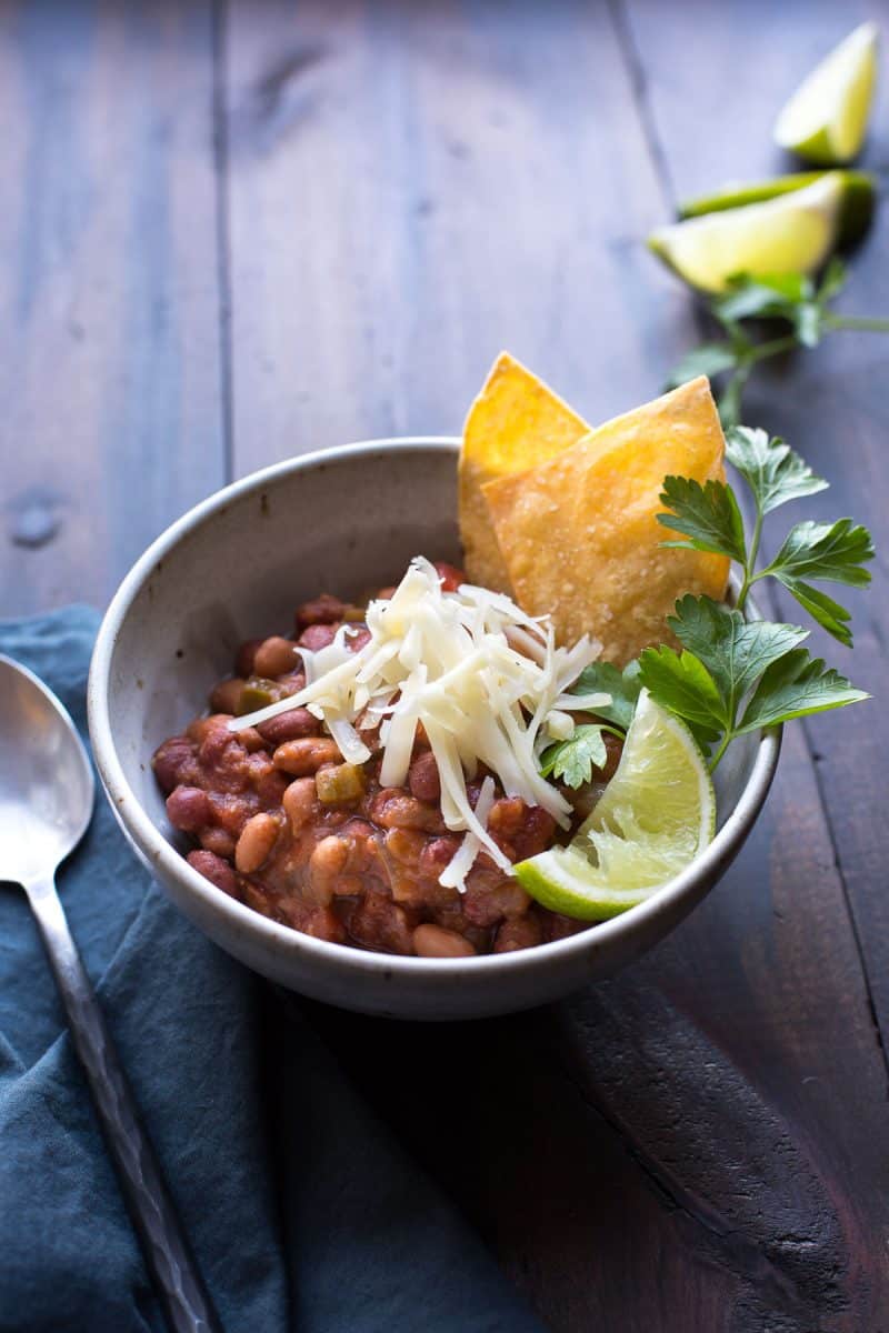 This vegetarian chili has deep smokey flavors complemented by hints of coffee and chocolate. With a bit of spice and a hint of sweetness, this may become your favorite chili! | @tasteLUVnourish | Vegetarian | Vegan | Gluten-Free