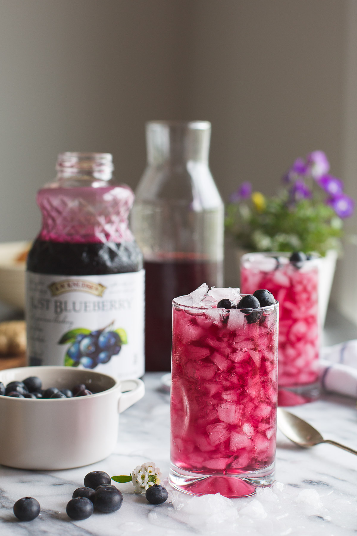 This Blueberry Switchel, or Haymaker's Punch is a fresh twist on an old time farmer's recipe. Do away with artificial sports or energy drinks and enjoy this natural thirst quenching drink. Vegan | Gluten Free | No Refined Sugar | @tasteLUVnourish