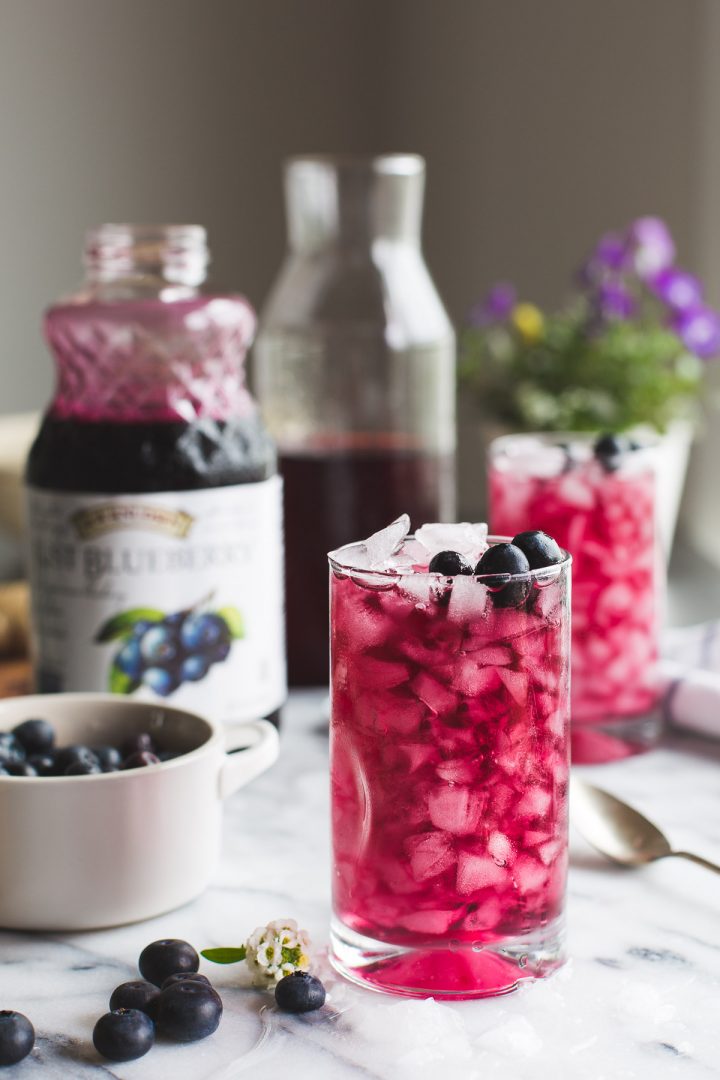 This Blueberry Switchel, or Haymaker's Punch is a fresh twist on an old time farmer's recipe. Do away with artificial sports or energy drinks and enjoy this natural thirst quenching drink. Vegan | Gluten Free | No Refined Sugar | @tasteLUVnourish