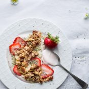 This Strawberry Almond Granola is made with fresh sweet strawberries and is packed with crunchy almonds, pure vanilla and sweet maple. Naturally gluten free and vegan. From @tasteLUVnourish