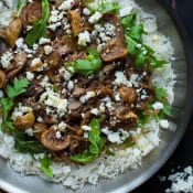 This easy skillet dinner pairs fragrant basmati rice with the bold flavors of deeply caramelized onions and portobello mushrooms with sweet bites of jammy figs and salty crumbles of feta cheese. From @tasteLUVnourish