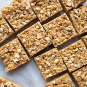 These Salted Peanut Butter Rice Crispy Treats are an easy, sweet and salty treat. Made with no refined sugars and all natural peanut butter, they are vegetarian, gluten free and paleo. From @tasteLUVnourish