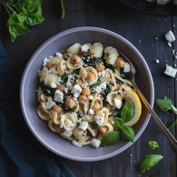 Orecchiette with Chickpeas Spinach and Feta is a simple and quick dinner that tastes incredible! In the time it takes to boil the pasta, you can prepare the rest of the ingredients and have dinner on the table in a flash. From @tasteLUVnourish #orecchiette #chickpeas #spinach #feta #easydinnerrecipes #pastarecipes