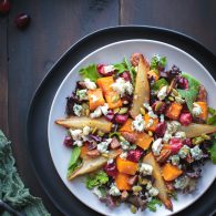 YUM! Roasted Autumn Harvest Salad is so delicious with sweet roasted pears, butternut squash and even roasted fresh cranberries! Top with some buttery pecans and salty blue cheese and you've got salad perfection! From @tasteLUVnourish #autumn #fall #salad #roasted #pears #butternut #cranberry #pecan #bluecheese #glutenfree #vegetarian #veganoptions www.tasteloveandnourish.com