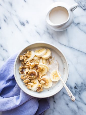 Once you try this Creamy Oat Bran Porridge, you may never go back to traditional oatmeal again. This make-ahead breakfast is the nourishment you need to get your mornings going! #breakfast #porridge #oatbran #oats #recipe #glutenfree #vegan #healthy @tasteLUVnourish