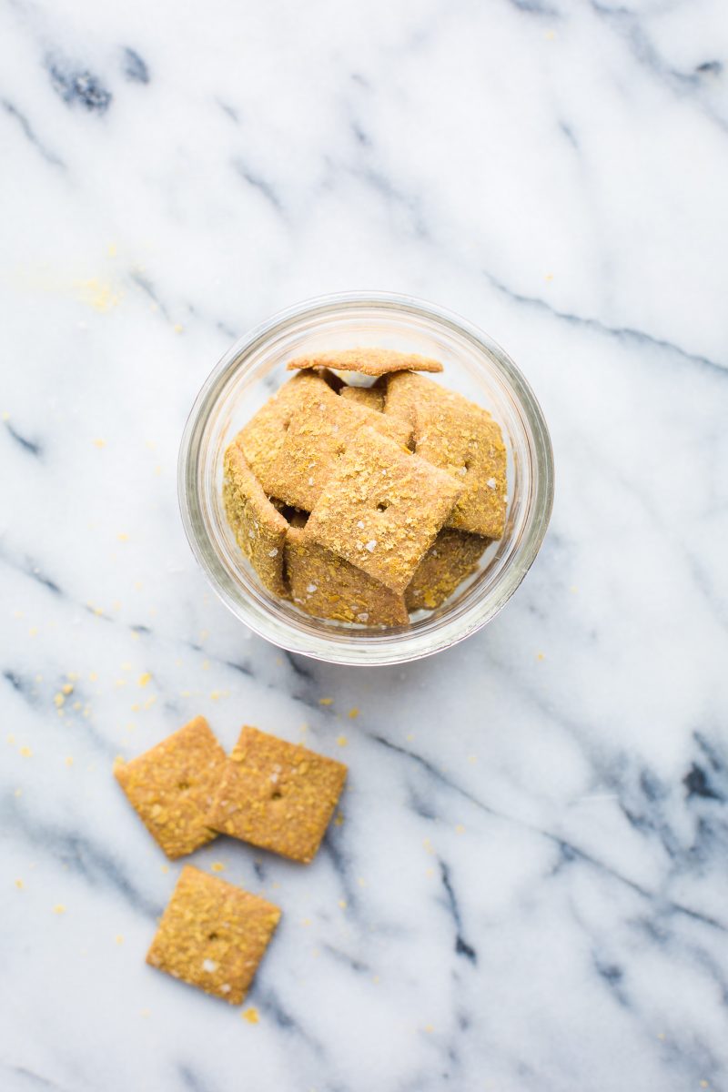 You will love these addicting Sourdough Cheese Crackers made with whole wheat flour and deliciously vegan! Keep a jar in the pantry for a savory, crunchy snack! #sourdough #cheesecrackers #crackers #vegan #recipe #healthy #snack #tasteloveandnourish