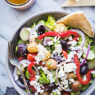 Greek Salad with Baby Potatoes-if you love Zoe's Kitchen's Greek Salad, you need this easy recipe! Makes a great lunch or dinner! #greeksalad #salad #zoeskitchen #saladdressing #easy #recipe #glutenfree #vegetarian #veganoptions #tasteloveandnourish | www.tasteloveandnourish.com