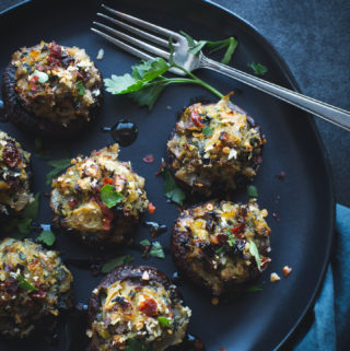 Spinach and Artichoke Stuffed Mushrooms - These simple stuffed mushrooms make a delicious appetizer or tasty dinner. www.tasteloveandnourish.com #vegan #vegetarian #glutenfreeoptions #appetizer #dinner #recipe #easy #healthy #tasteloveandnourish